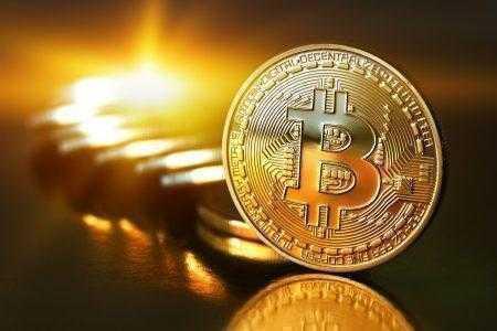 Курс Bitcoin приблизился к $7000